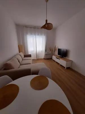 a living room with a couch and a table at Interno 4 al Vaticano in Rome