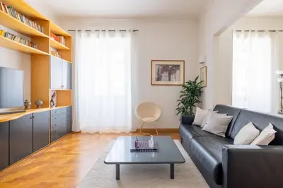 a living room with a couch and a table at DOMUS GIULIA in Rome