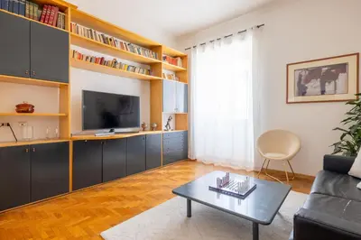 a living room with a couch and a coffee table at DOMUS GIULIA in Rome