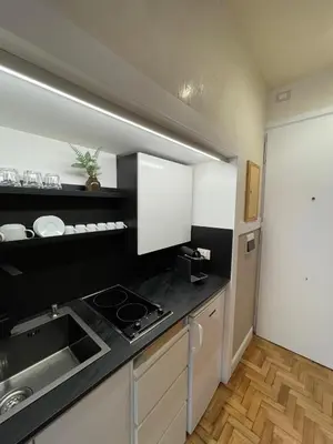 a kitchen with a sink and a stove at Elian Apartament in The Center of Rome #3 Colosseo in Rome
