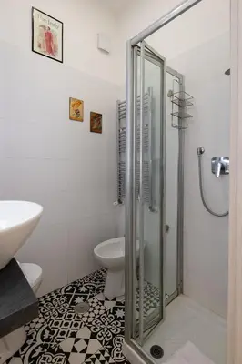 a bathroom with a shower and a toilet at La Dolce Vita - Testaccio Authentic District 2 in Rome
