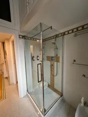 a glass shower with a toilet in a bathroom at S.Pietro Elvira's retro apartment in Rome