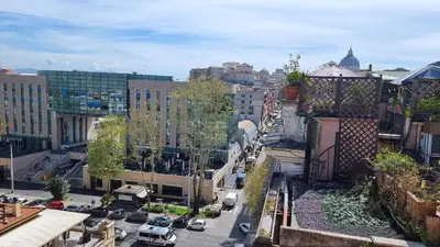 an aerial view of a city street with buildings at Val's Vatican Wall Apartment in Rome