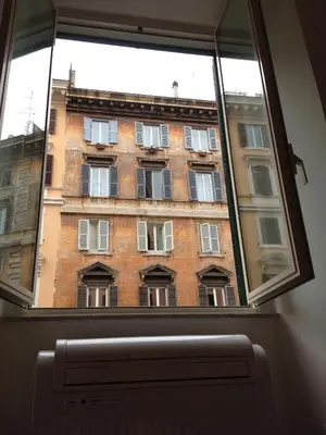 a view of a building through a window at Lombardo in Rome