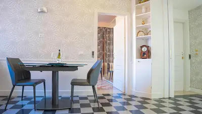 a dining room with a table and chairs at Sibylla in Rome in Rome