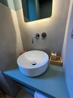 a bathroom with a white sink and a mirror at CARPE DIEM Ponte Milvio Olimpico Farnesina in Rome
