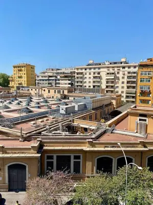 a view of a city with buildings and trains at Al Mamalo Rome Luxury Apartment in Rome