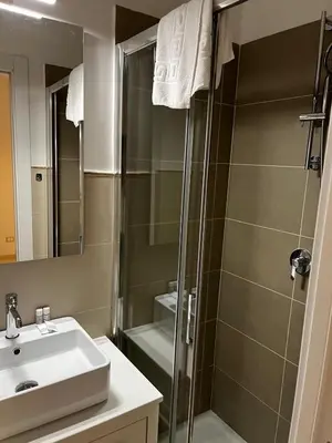 a bathroom with a shower and a sink at Be Your Home - Stendardi's House in Rome