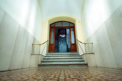 an entrance to a building with a blue door at Casa Anna a Roma in Rome