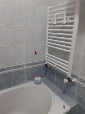 a bathroom with a white toilet in a room at La casa di Gloria in Rome