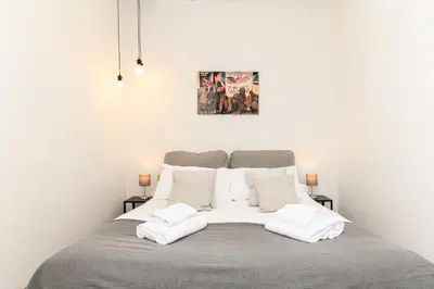a bedroom with a bed with two white pillows at Central near Piazza Navona by NDP rent in Rome