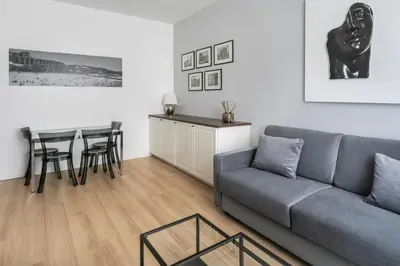 a living room with a couch and a table at Allegra Domus in Rome