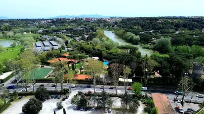 an aerial view of a city with a river at Exclusive 230m2 Apt with Terrace and Panoramic Balcony in Rome