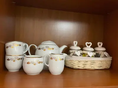 a group of vases and a basket on a table at Dimora San Giovanni in Rome