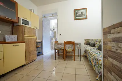 a living room with a couch and a table at Dimora San Giovanni in Rome