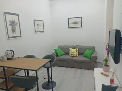a living room with a couch and a table at Domus Fanti in Rome