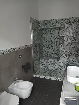 a bathroom with a sink and a toilet at Domus Fanti in Rome
