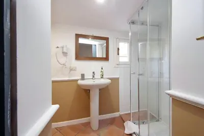 a bathroom with a sink and a shower at Pantheon 2 Bedrooms in Rome
