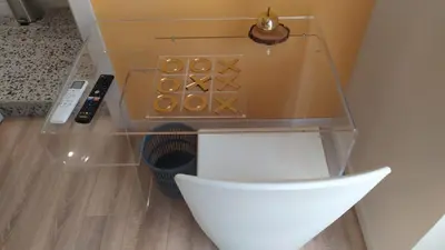 a glass box with a remote control in it at Roma Furio Camillo Holiday Home in Rome