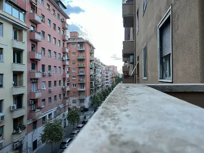 a view of a city street with tall buildings at Roma Furio Camillo Holiday Home in Rome