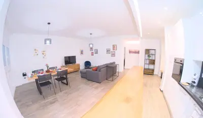 a large living room with a couch and a table at Toscani 24 in Rome