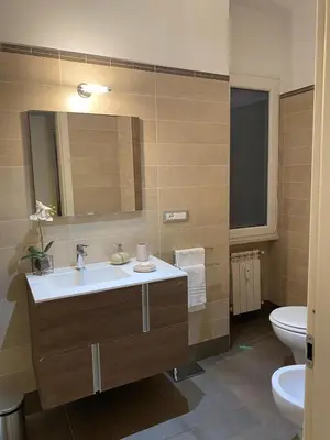 a bathroom with a sink and a toilet at Casa Fontana - zona San Giovanni Colosseo in Rome