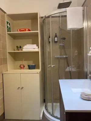 a bathroom with a shower and a sink at Casa Fontana - zona San Giovanni Colosseo in Rome