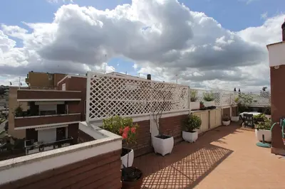 a balcony of a building with plants on it at Pironti Flat in Rome