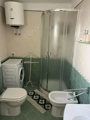 a bathroom with a shower and a toilet and a sink at Pironti Flat in Rome