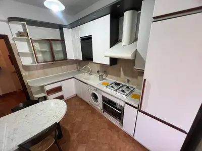 a small kitchen with a stove and a sink at Paki House Luxury in Rome