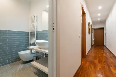 a bathroom with a sink and a toilet in it at Jubilee apartment Vatican Museums in Rome