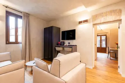a bedroom with a large bed in a room at Residenza Leutari in Rome
