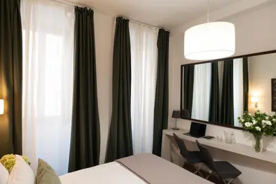 a hotel room with a bed and a mirror at Banchi Vecchi Stay Apt Suite Navona in Rome