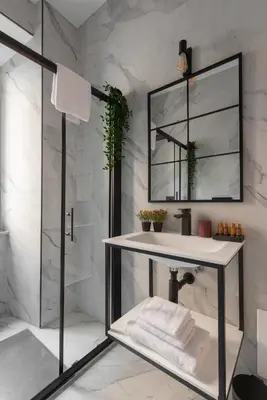 a bathroom with a sink and a shower at Termini apartments in Rome