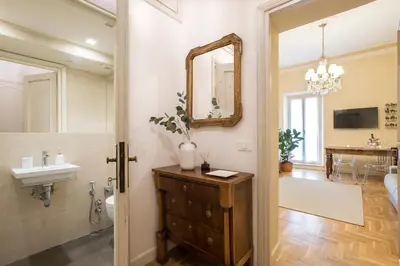 a bathroom with a sink and a mirror at AV Domus Propaganda in Rome