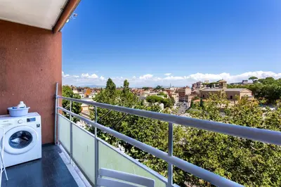 a washing machine on the balcony of a building at Cipro Vatican House in Rome