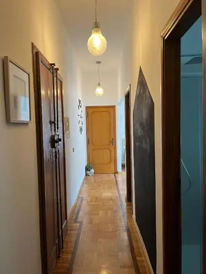 a hallway with a door and a hallwayngth at Balduina View in Rome
