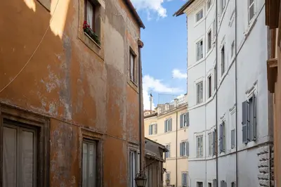 a view of an alley between two buildings at Navona Modern by Rental in Rome in Rome
