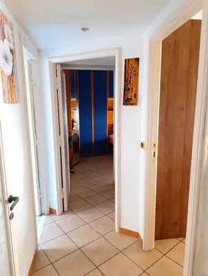 a small bedroom with a bed and a window at Bribry Home in Rome