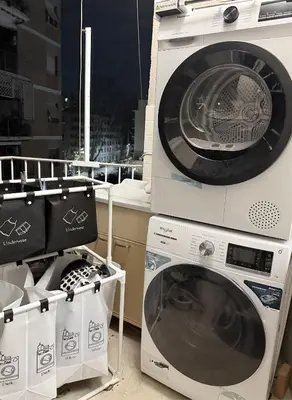 two washing machines are sitting next to each other at Sanpaolo Modern Aesthetic B&B in Rome