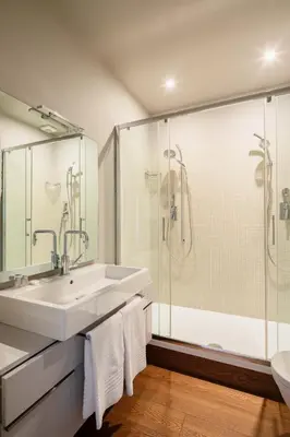 a bathroom with a sink and a shower at 2 bedrooms flat near Via Veneto in Rome