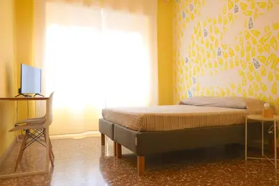 a bedroom with a bed and a window at Rome Sleep Home Bed & Breakfast in Rome