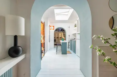 a hallway with an archway in a house at Domus Fori Imperiali in Rome