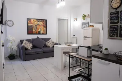 a living room with a couch and a table at Casa Daniela in Rome