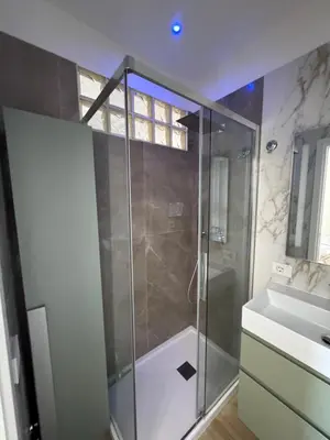 a bathroom with a shower and a sink at Rome at Hand in Rome