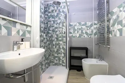 a bathroom with a sink and a toilet at Aquas Salvias in Rome