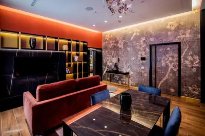 a living room with a couch and a table at Luxury Rhome Via della Croce in Rome