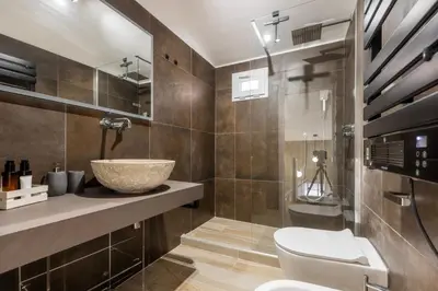 a bathroom with a sink and a toilet at MauveSweetRhome 2 in Rome