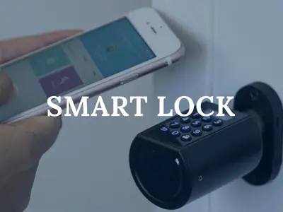 a hand holding a smart lock with a remote control at The Best Rent - Spacious one-bedroom apartment near Colosseum in Rome