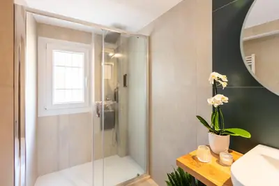 a bathroom with a shower and a sink at Residenza Il Vicolo by Hili in Rome